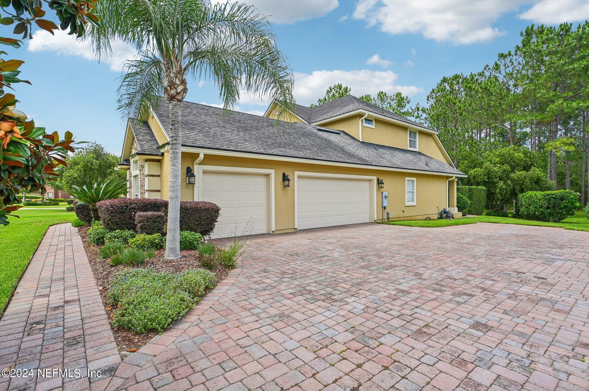 283 Stonewell Drive St. Johns, FL 32259 - Photo 5 of 72 Extended driveway and 3 car garage