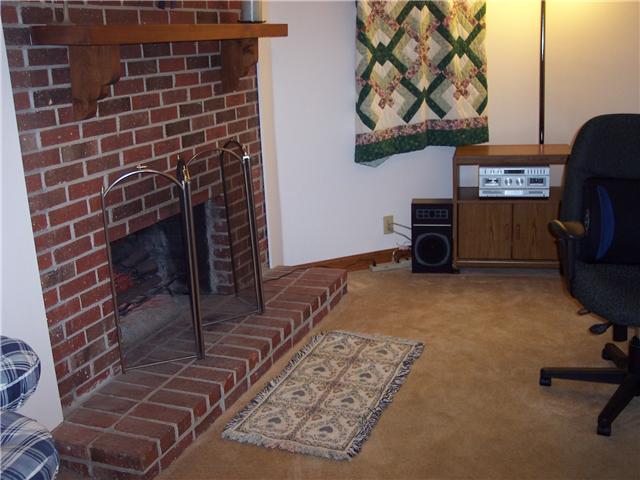 4001 Anderson Road, Unit D74 Nashville, TN 37217 - Photo 10 of 17 Den or office with a fireplace