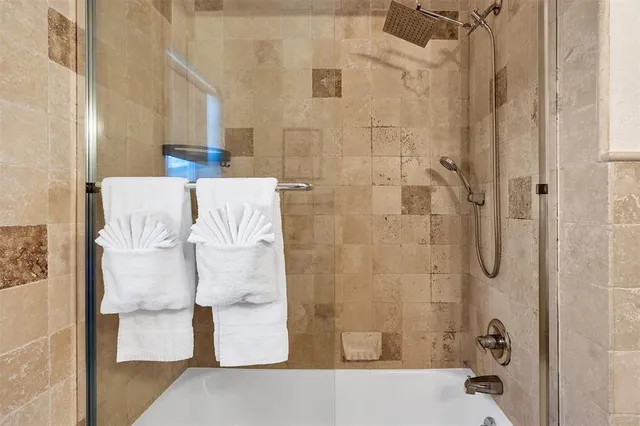 a bathroom with a white tub