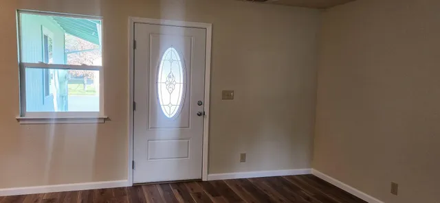 a view of backyard with green space