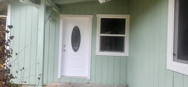 a bathroom with a shower and a sink