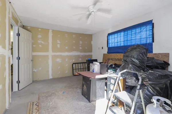 a outdoor living space with furniture and a fireplace