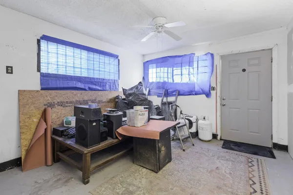 a view of a livingroom with furniture and a couch