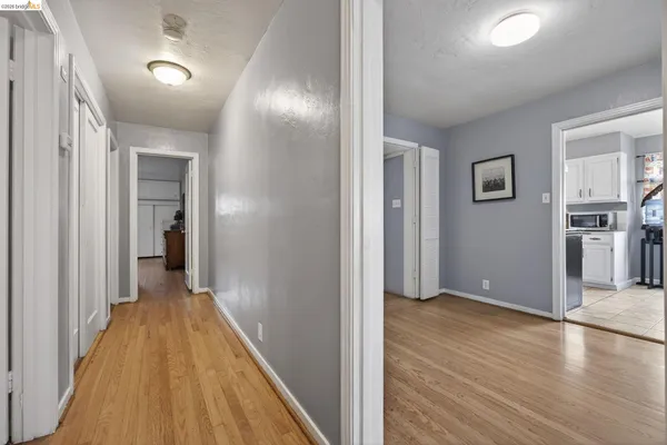 a view of a room with wooden walls
