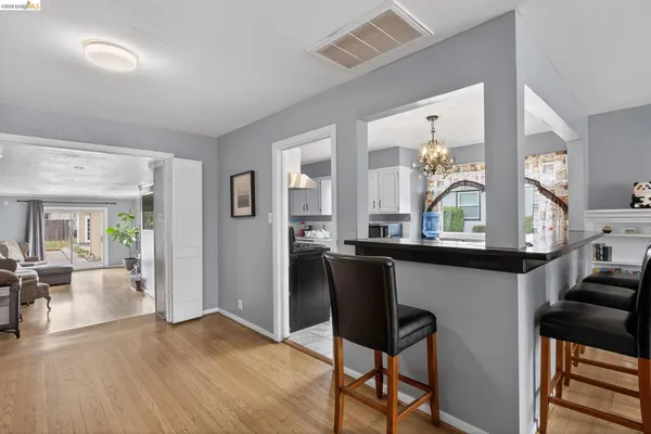 a kitchen with stainless steel appliances a sink and cabinets