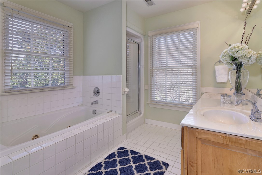 101 Spring Branch Williamsburg, VA 23185 - Photo 21 of 44 a bathroom with a bathtub sink and mirror