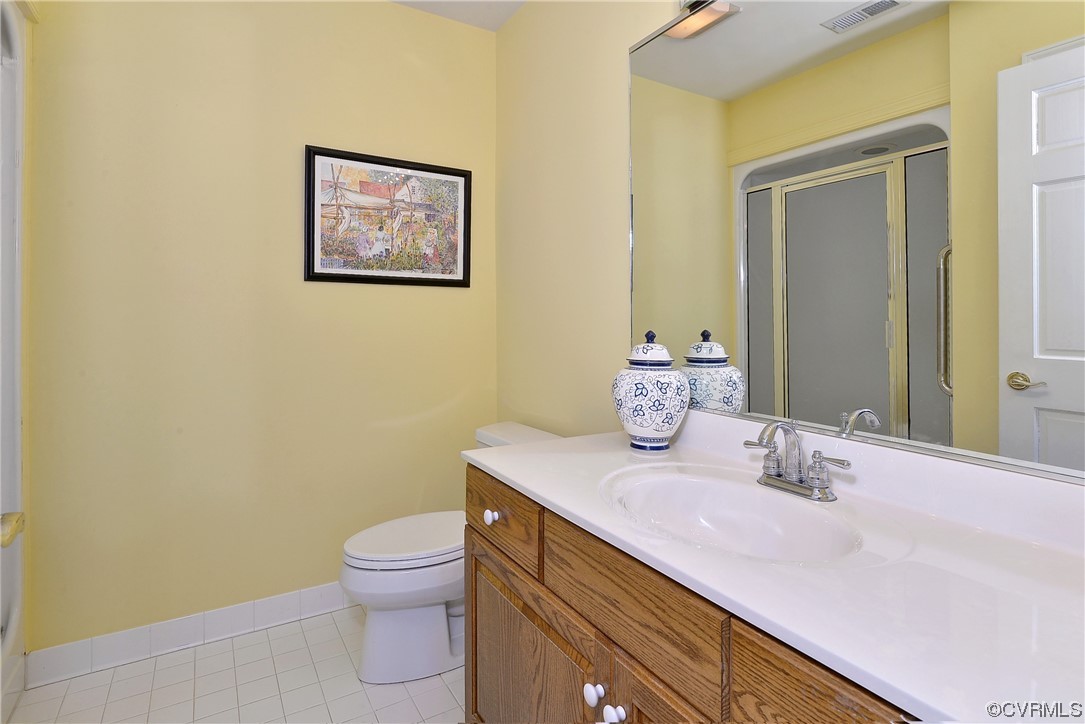 101 Spring Branch Williamsburg, VA 23185 - Photo 24 of 44 a bathroom with a sink a toilet and mirror