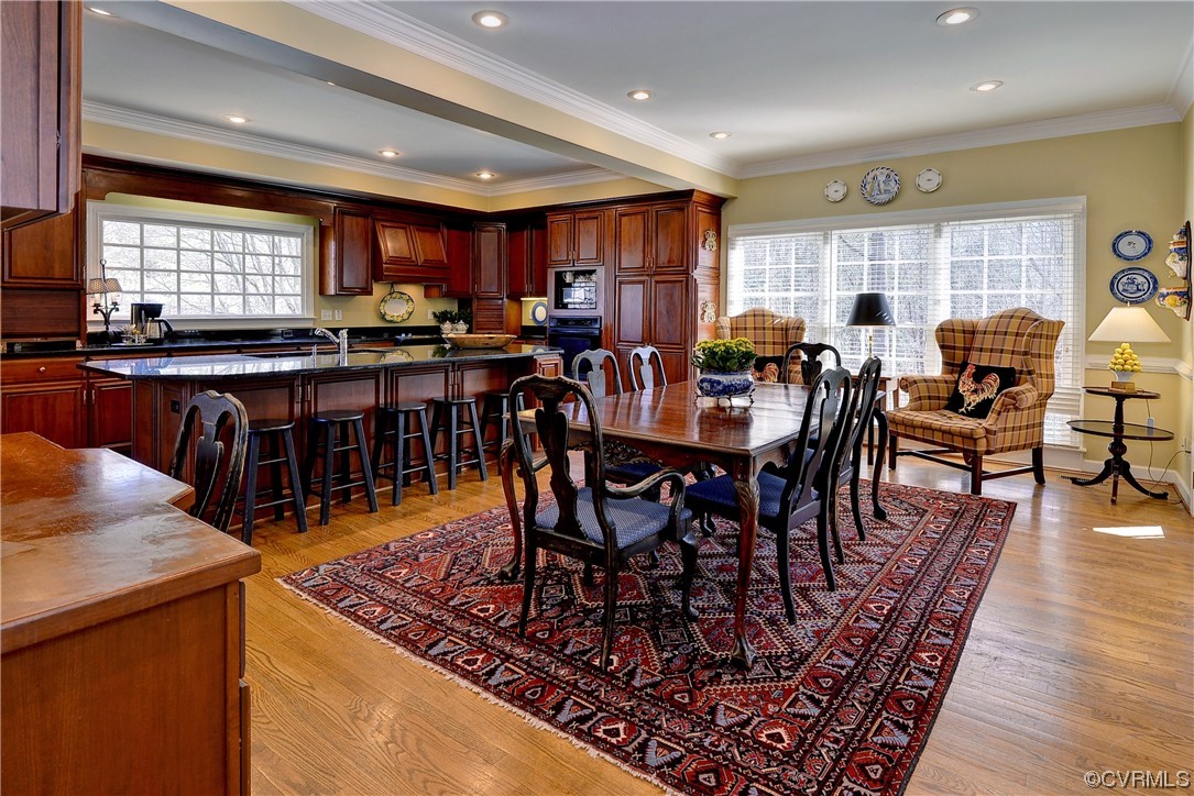 101 Spring Branch Williamsburg, VA 23185 - Photo 9 of 44 a view of a dining room with furniture window and wooden floor