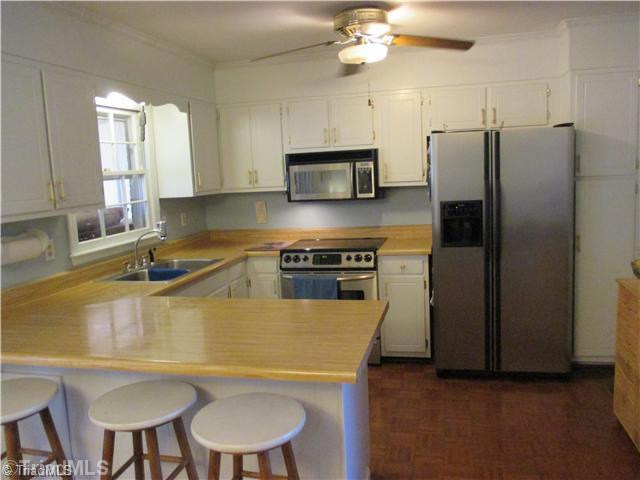 720 Lakedale Road Colfax, NC 27235 - Photo 3 of 14 Kitchen.