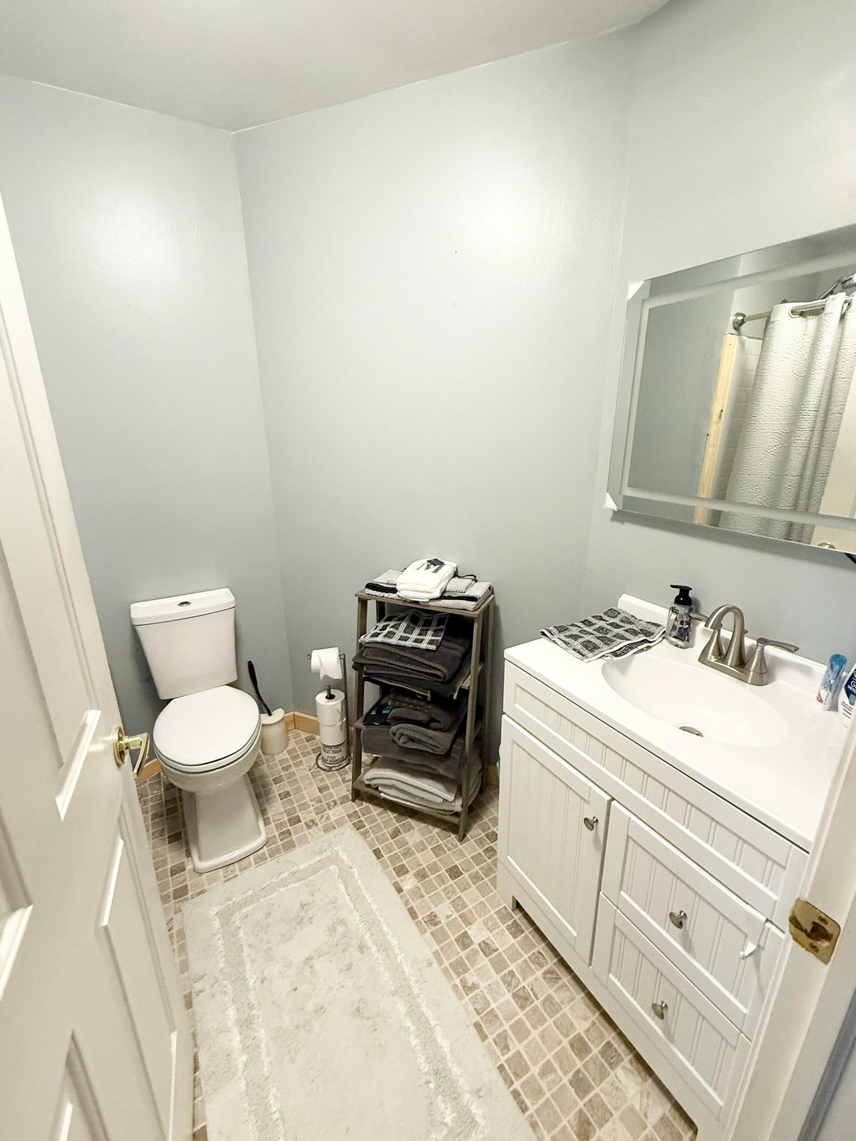 4 Rutledge Avenue Del Haven, NJ 08251 - Photo 13 of 21 a bathroom with a sink toilet and mirror
