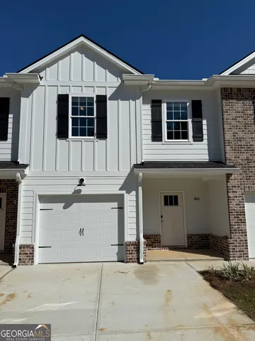 a front view of a house with windows