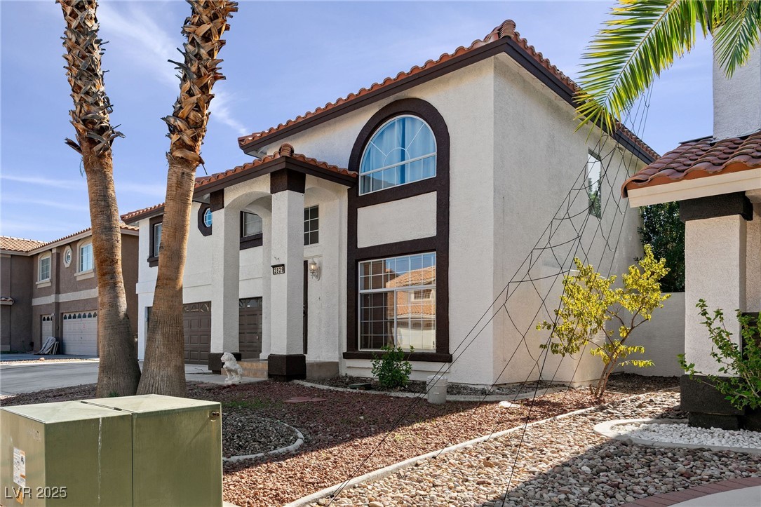 2829 Via Florentine Street Henderson, NV 89074 - Photo 11 of 48 Mediterranean / spanish-style house with a tiled roof and stucco siding