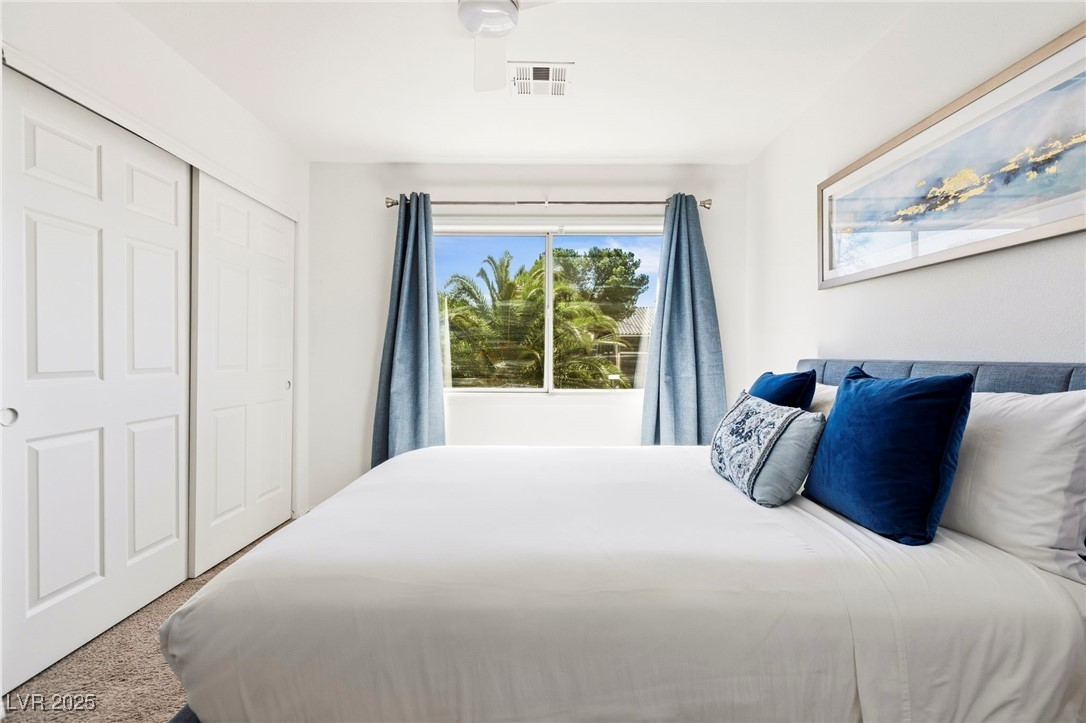 2829 Via Florentine Street Henderson, NV 89074 - Photo 22 of 48 Carpeted bedroom with a closet and ceiling fan