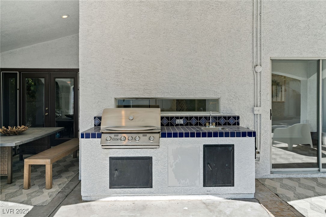 2829 Via Florentine Street Henderson, NV 89074 - Photo 33 of 48 View of patio featuring area for grilling and a sink
