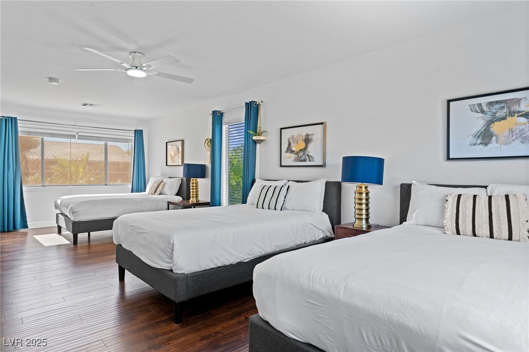 2829 Via Florentine Street Henderson, NV 89074 - Photo 39 of 48 Bedroom with dark wood finished floors and ceiling fan