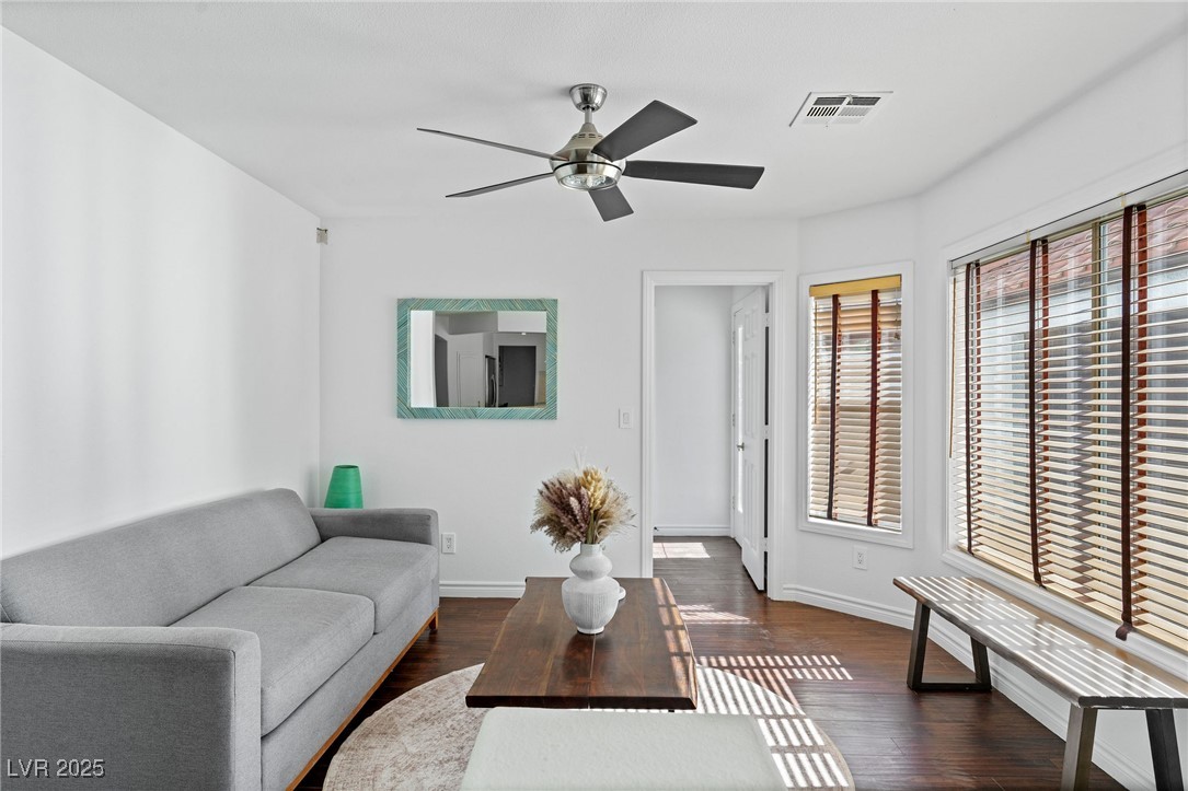 2829 Via Florentine Street Henderson, NV 89074 - Photo 44 of 48 Living room featuring dark wood finished floors and ceiling fan
