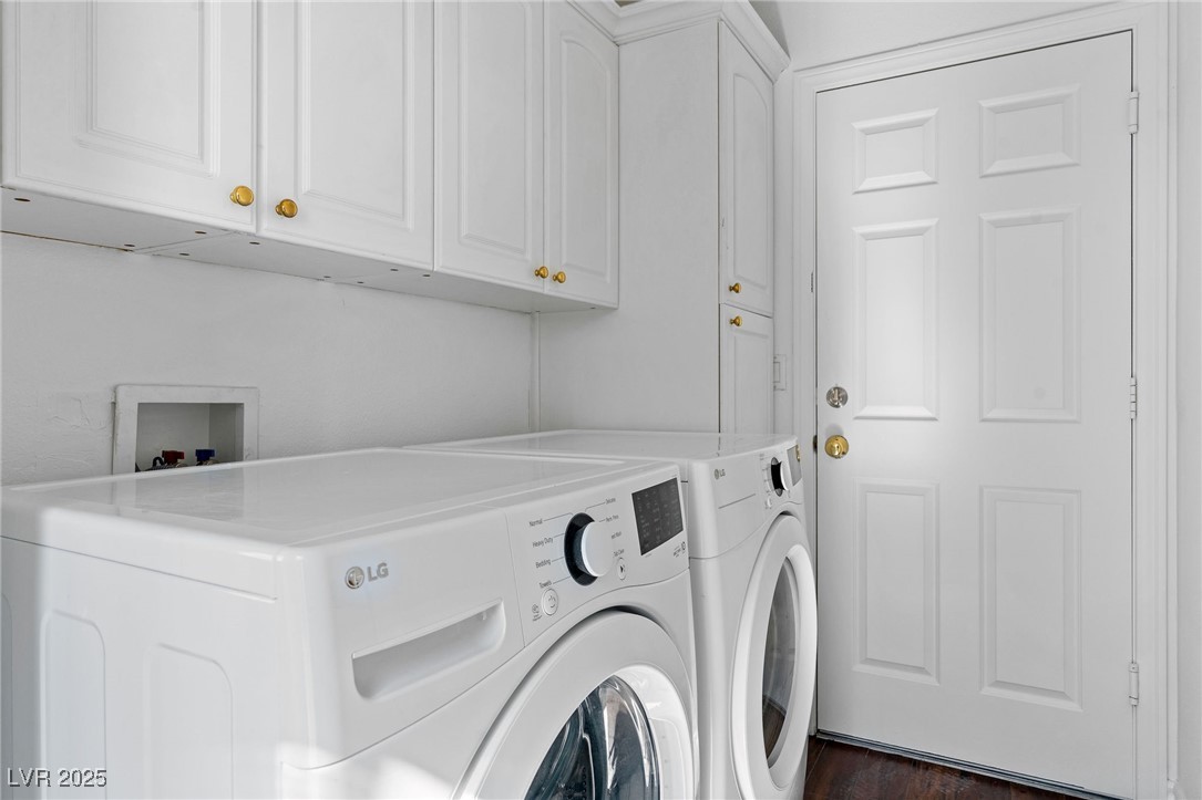 2829 Via Florentine Street Henderson, NV 89074 - Photo 47 of 48 Laundry area with cabinet space, washing machine and dryer, and dark wood finished floors