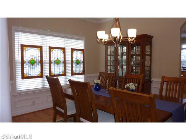 3201 Cross Tree Road Winston-Salem, NC 27106 - Photo 3 of 16 Dining Room. Beautiful and open Dining Room has hardwood floors.