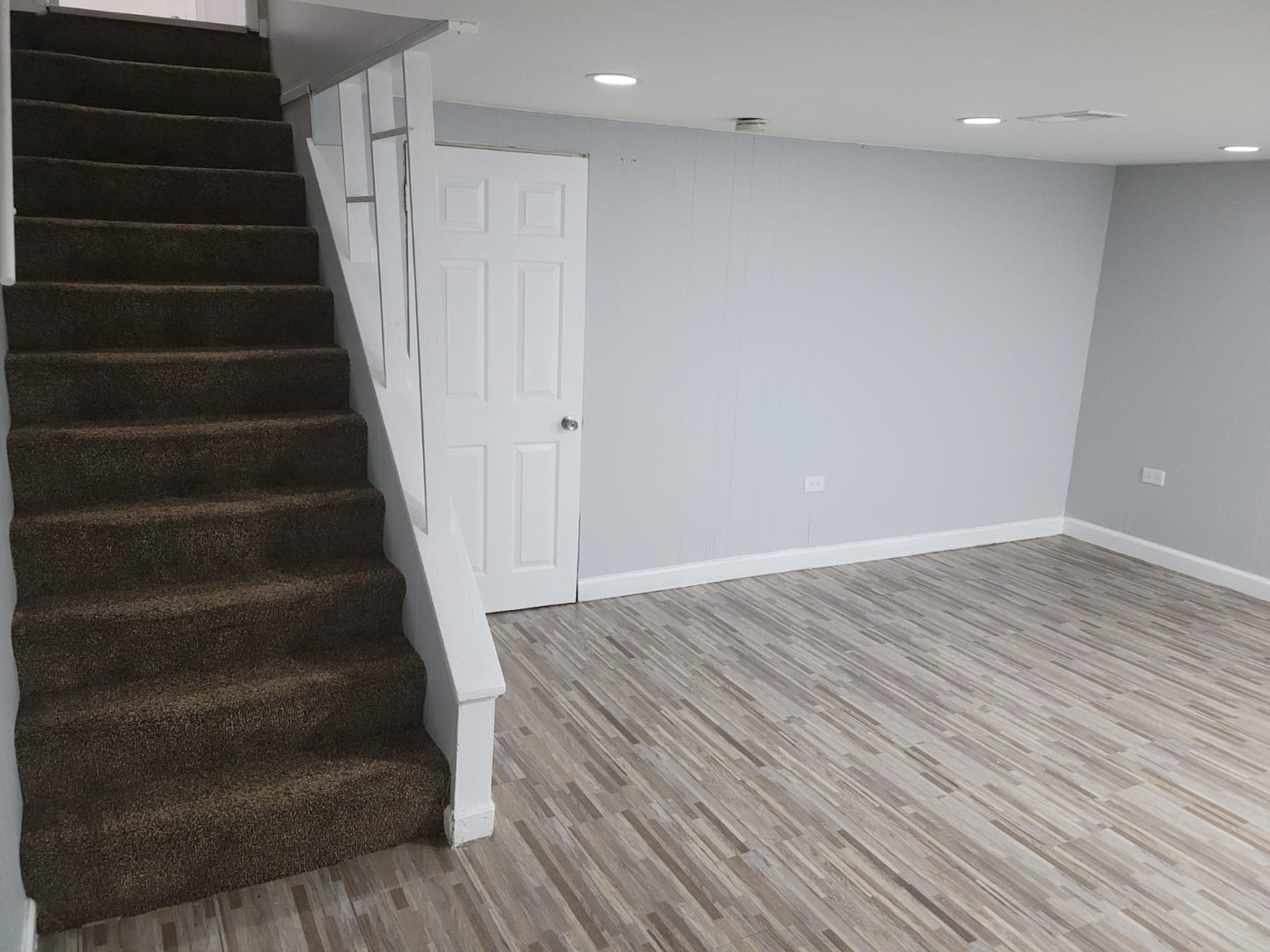 10081 Frontage Road, Unit D Skokie, IL 60077 - Photo 10 of 12 a view of an entryway with wooden floor