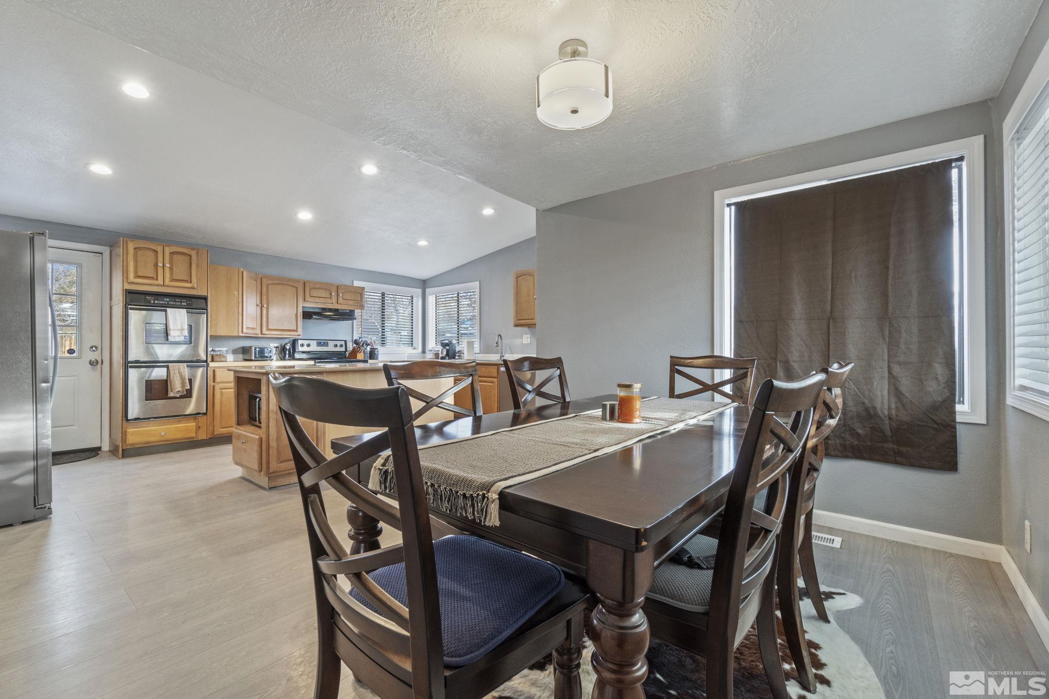 3940 Macaw Lane Reno, NV 89508 - Photo 15 of 35 a view of a dining room with furniture