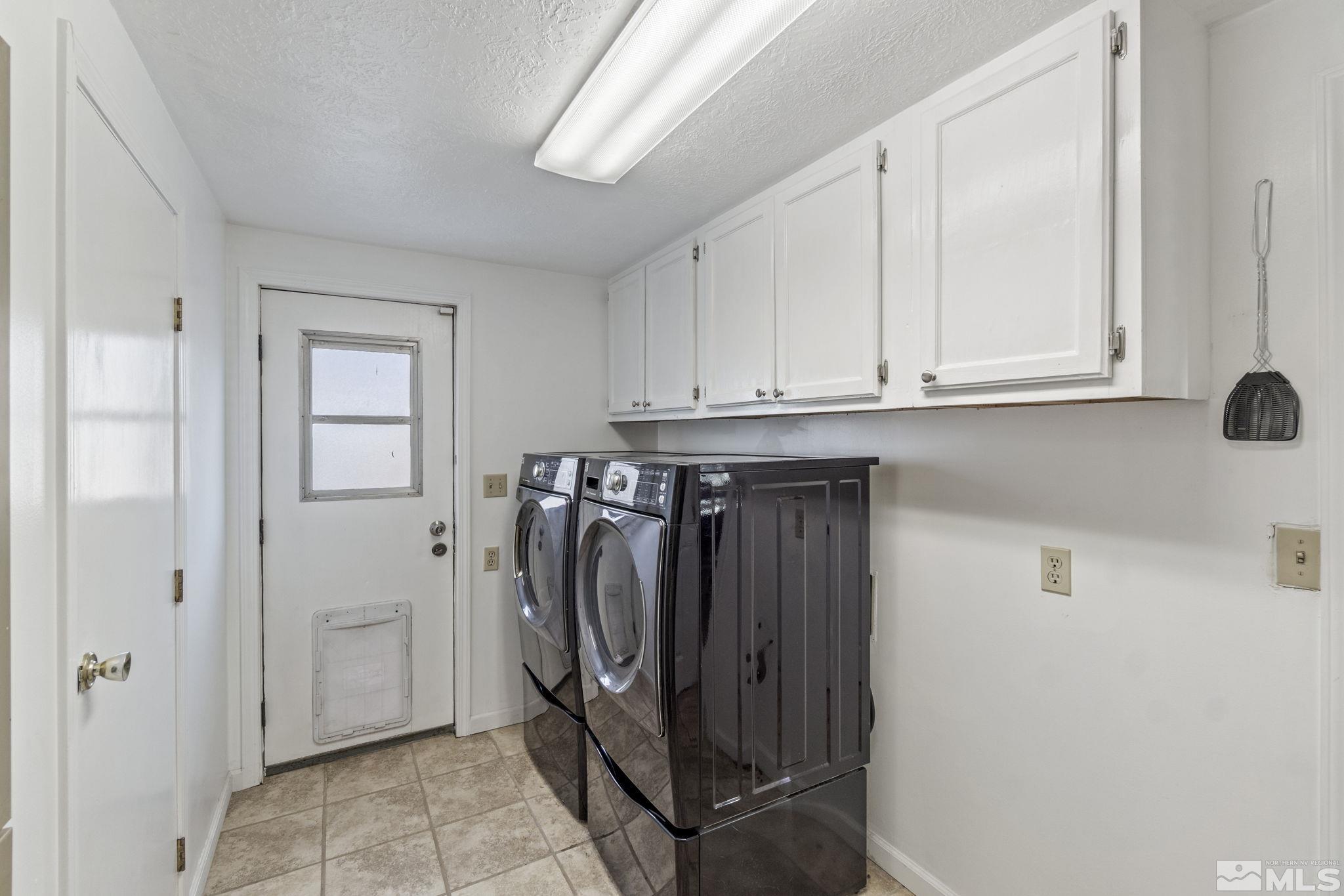 3940 Macaw Lane Reno, NV 89508 - Photo 22 of 35 a utility room with cabinets