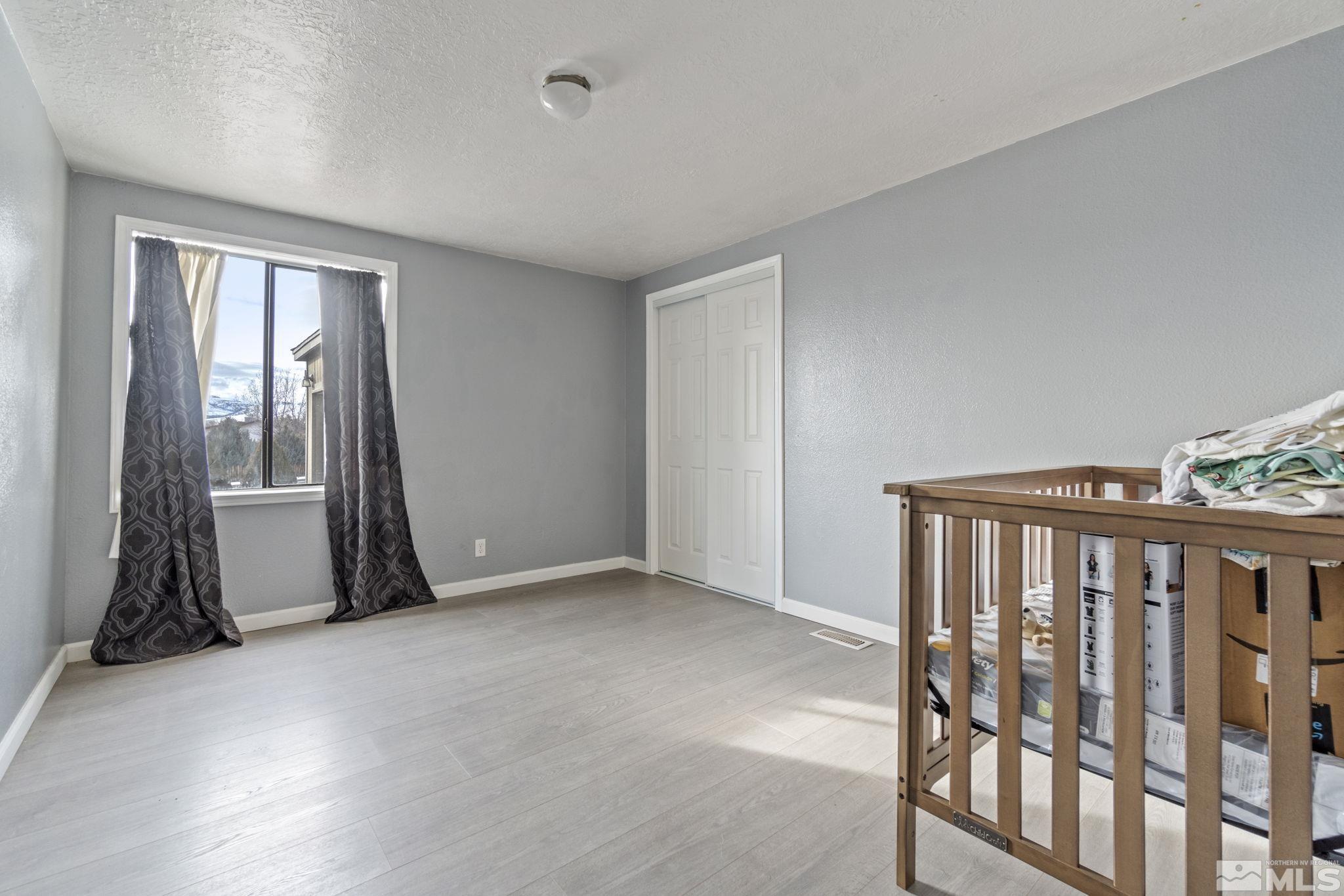3940 Macaw Lane Reno, NV 89508 - Photo 23 of 35 a view of livingroom with furniture and windows