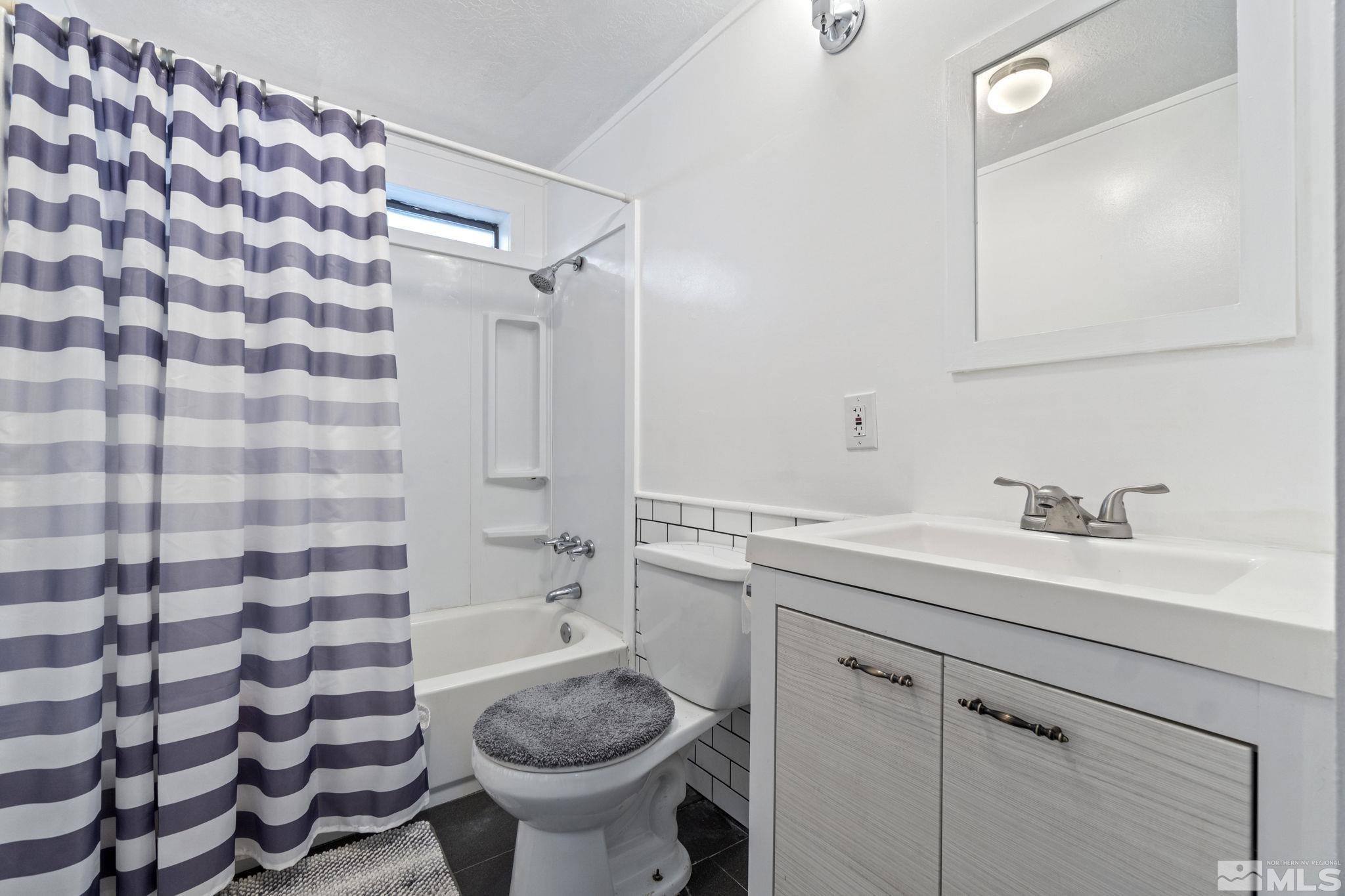 3940 Macaw Lane Reno, NV 89508 - Photo 24 of 35 a bathroom with a sink toilet and shower
