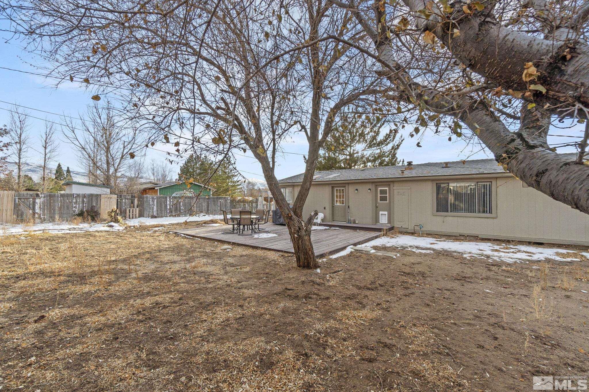 3940 Macaw Lane Reno, NV 89508 - Photo 33 of 35 a view of a yard with a tree