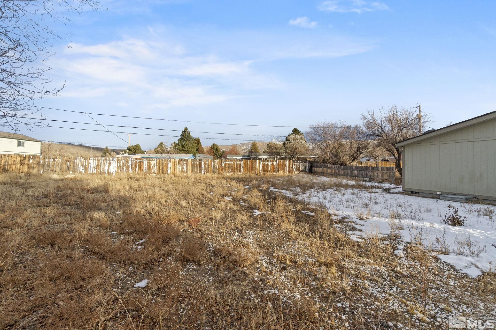 3940 Macaw Lane Reno, NV 89508 - Photo 34 of 35 a view of a yard with an outdoor space