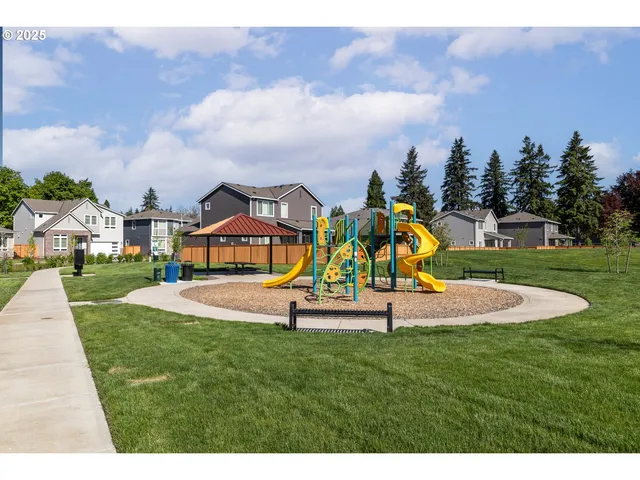 a view of a playground with a swimming pool