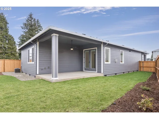 a view of a backyard with a garden
