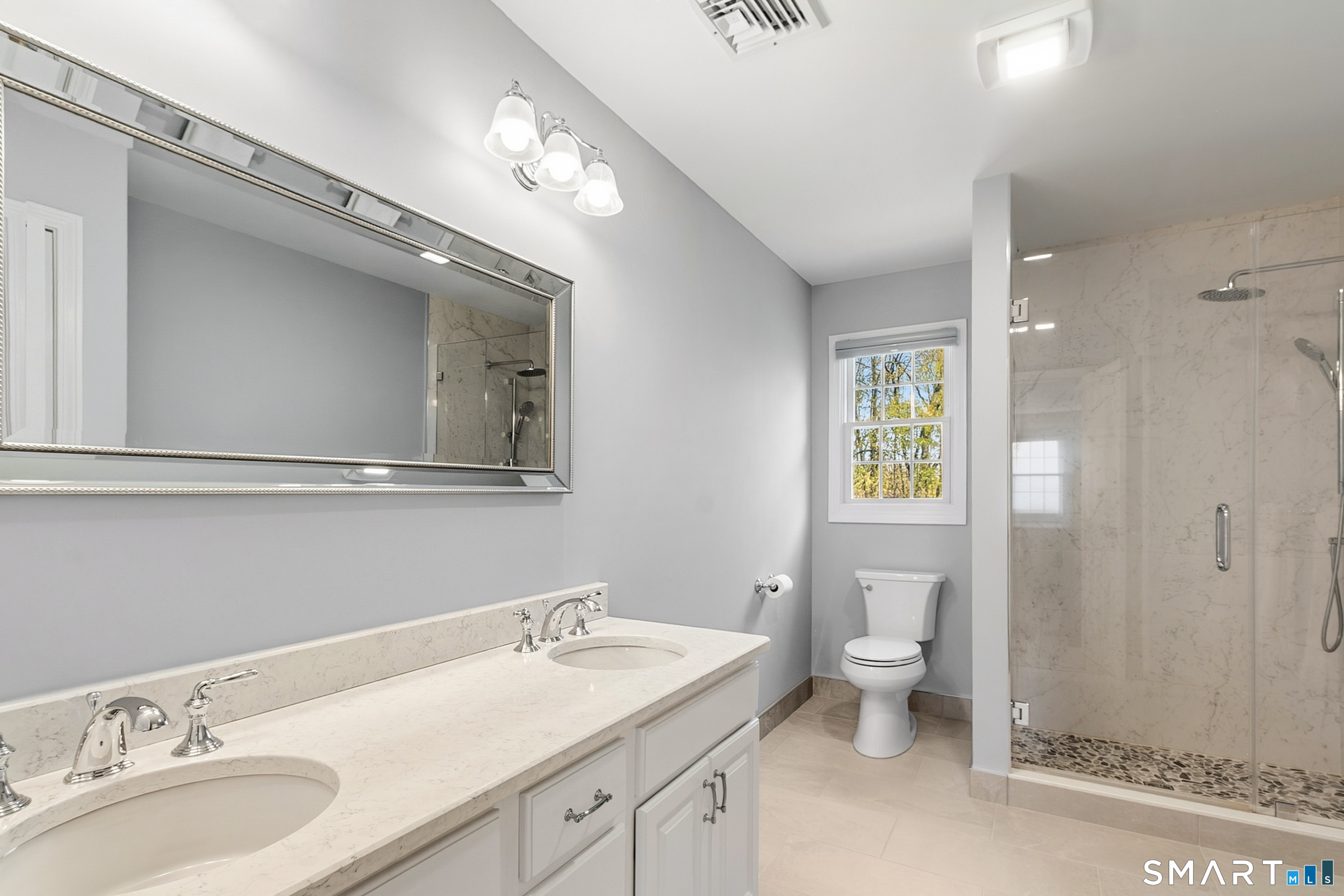 45 Beardsley Road New Milford, CT 06776 - Photo 21 of 40 beautiful primary bathroom updated with a stand-up shower and new tile flooring.