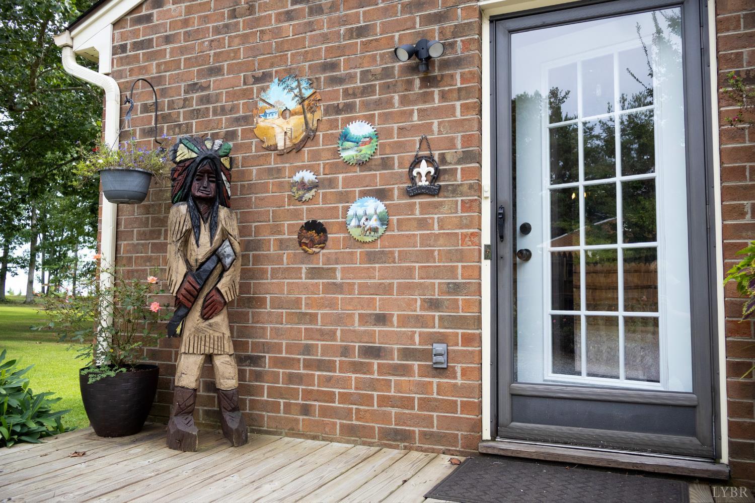 14611 Leesville Road Evington, VA 24550 - Photo 28 of 30 a front view of a house with a garden