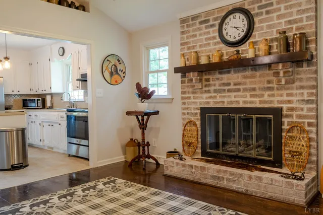 a clock on a table with wooden floor