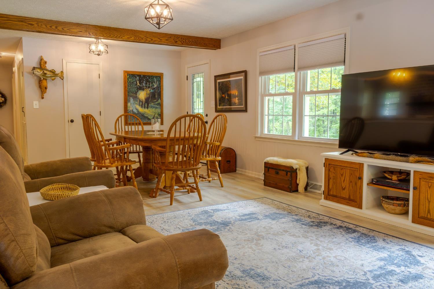 14611 Leesville Road Evington, VA 24550 - Photo 5 of 30 a living room with furniture and a flat screen tv