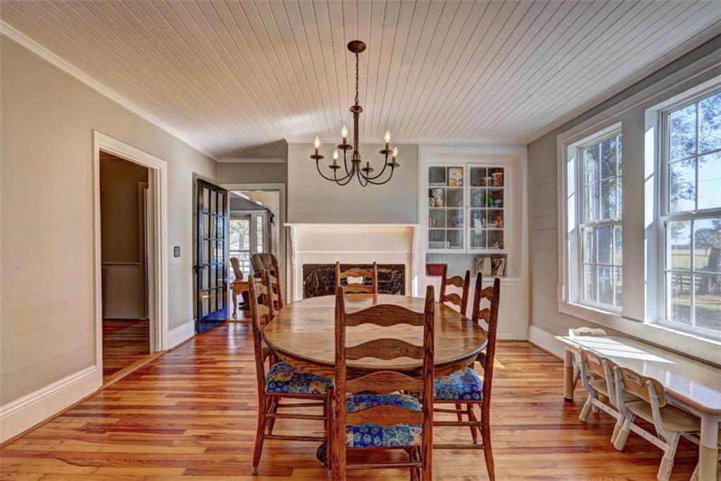 2870 Prospect Road Rutledge, GA 30663 - Photo 21 of 100 a view of a dining room with furniture window and wooden floor