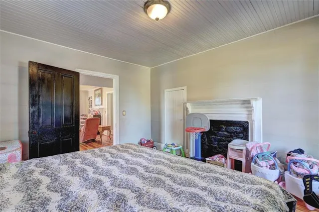 a living room with furniture a ceiling fan and a rug