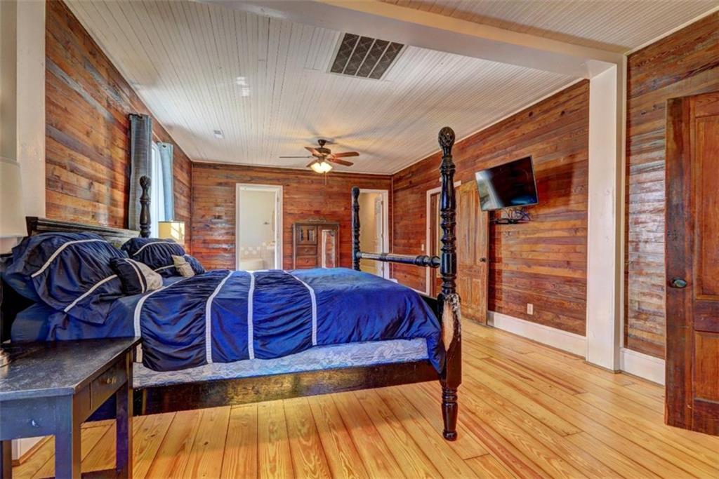 2870 Prospect Road Rutledge, GA 30663 - Photo 43 of 100 a living room with furniture a ceiling fan and a rug