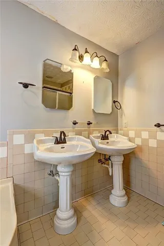 a view of a backyard with large trees