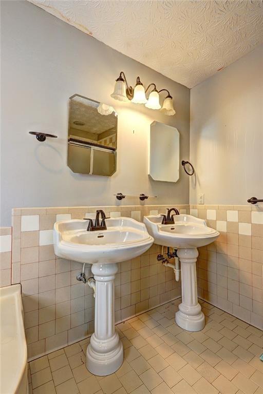 2870 Prospect Road Rutledge, GA 30663 - Photo 45 of 100 a bathroom with a sink and mirror