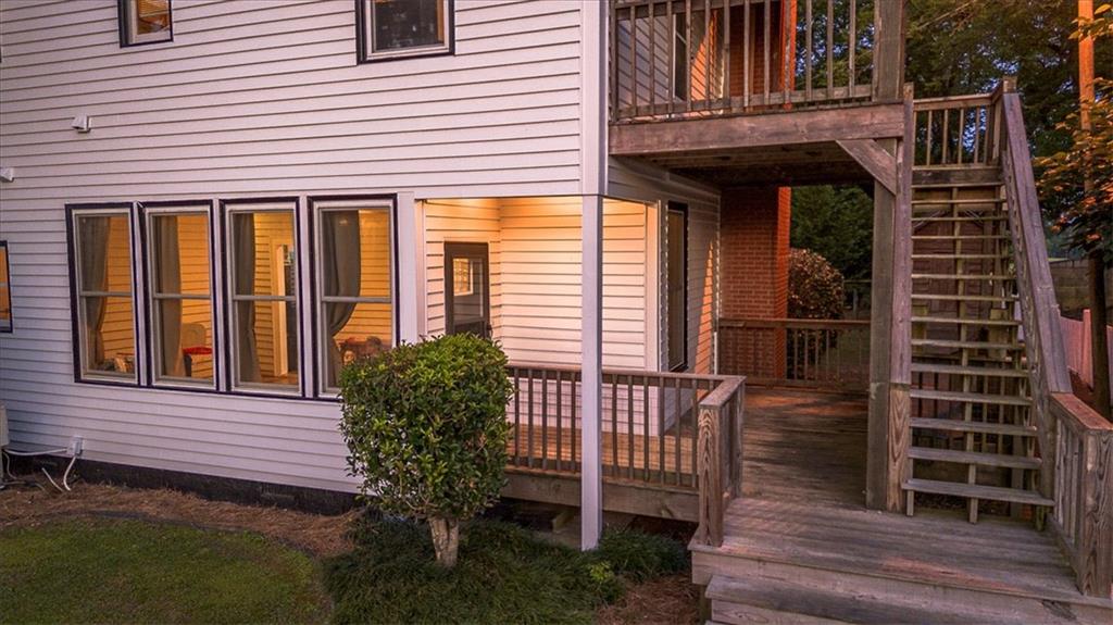 2870 Prospect Road Rutledge, GA 30663 - Photo 60 of 100 a view of a house with a large window and wooden fence