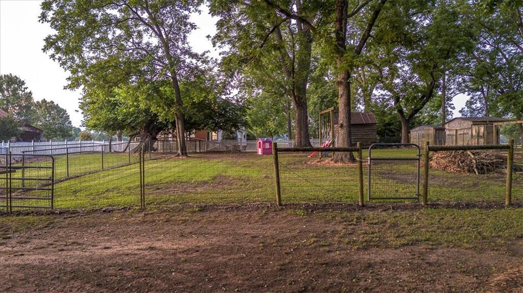 2870 Prospect Road Rutledge, GA 30663 - Photo 78 of 100 a view of a backyard with wooden fence