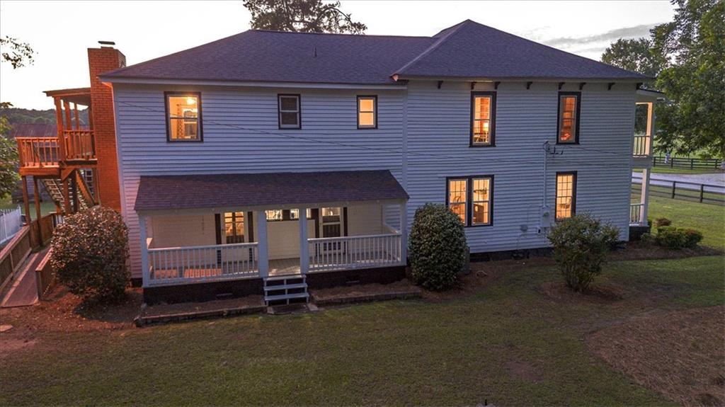 2870 Prospect Road Rutledge, GA 30663 - Photo 83 of 100 a front view of a house with a garden