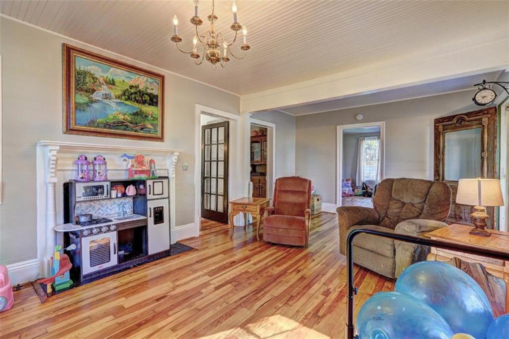 2870 Prospect Road Rutledge, GA 30663 - Photo 10 of 100 a living room with furniture and a kitchen view