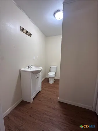 a bathroom with a sink and a toilet