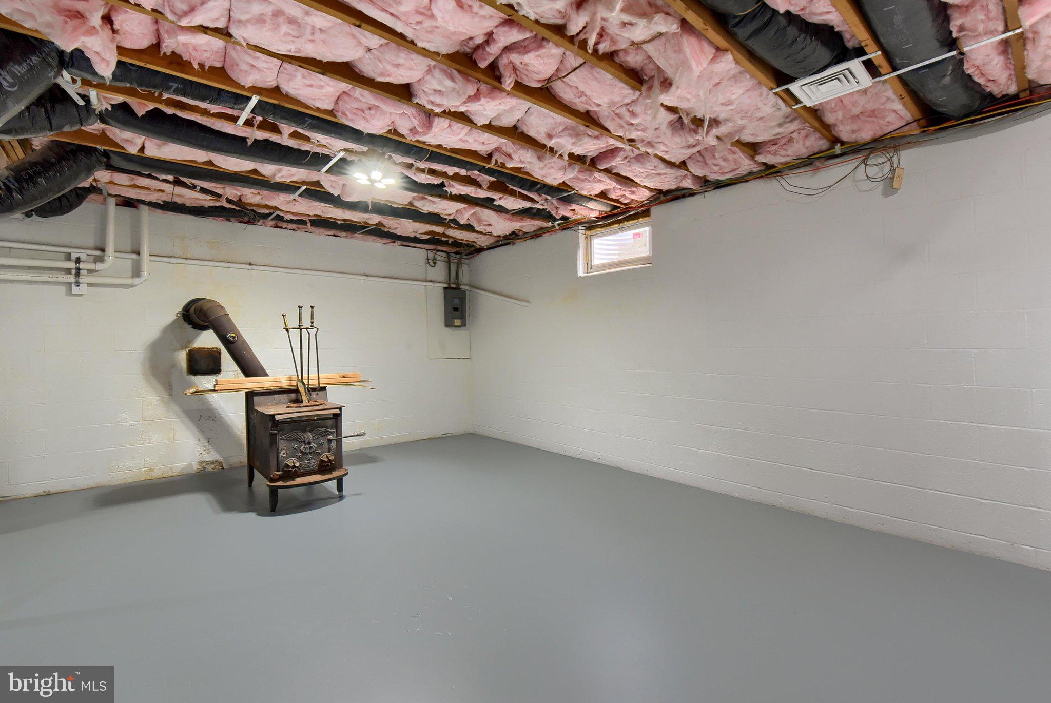 3740 Beagle Road Middletown, PA 17057 - Photo 35 of 70 a view of a room with water heater and wooden racks