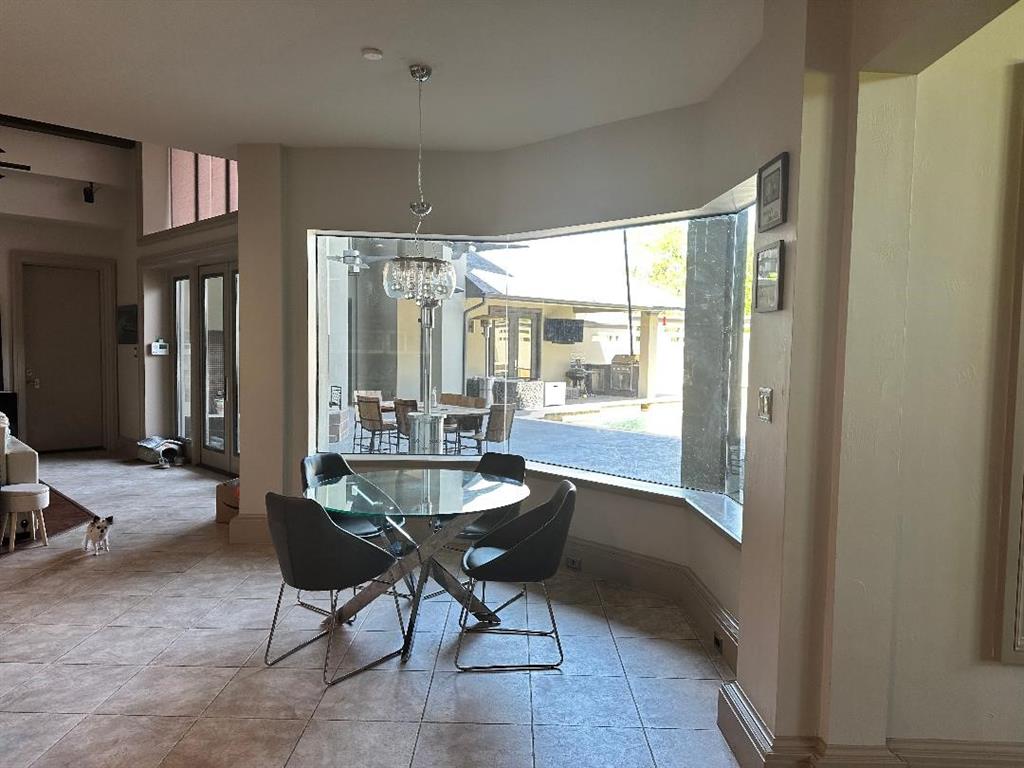 8300 Willow Circle Terrell, TX 75160 - Photo 11 of 14 Dining area featuring a chandelier