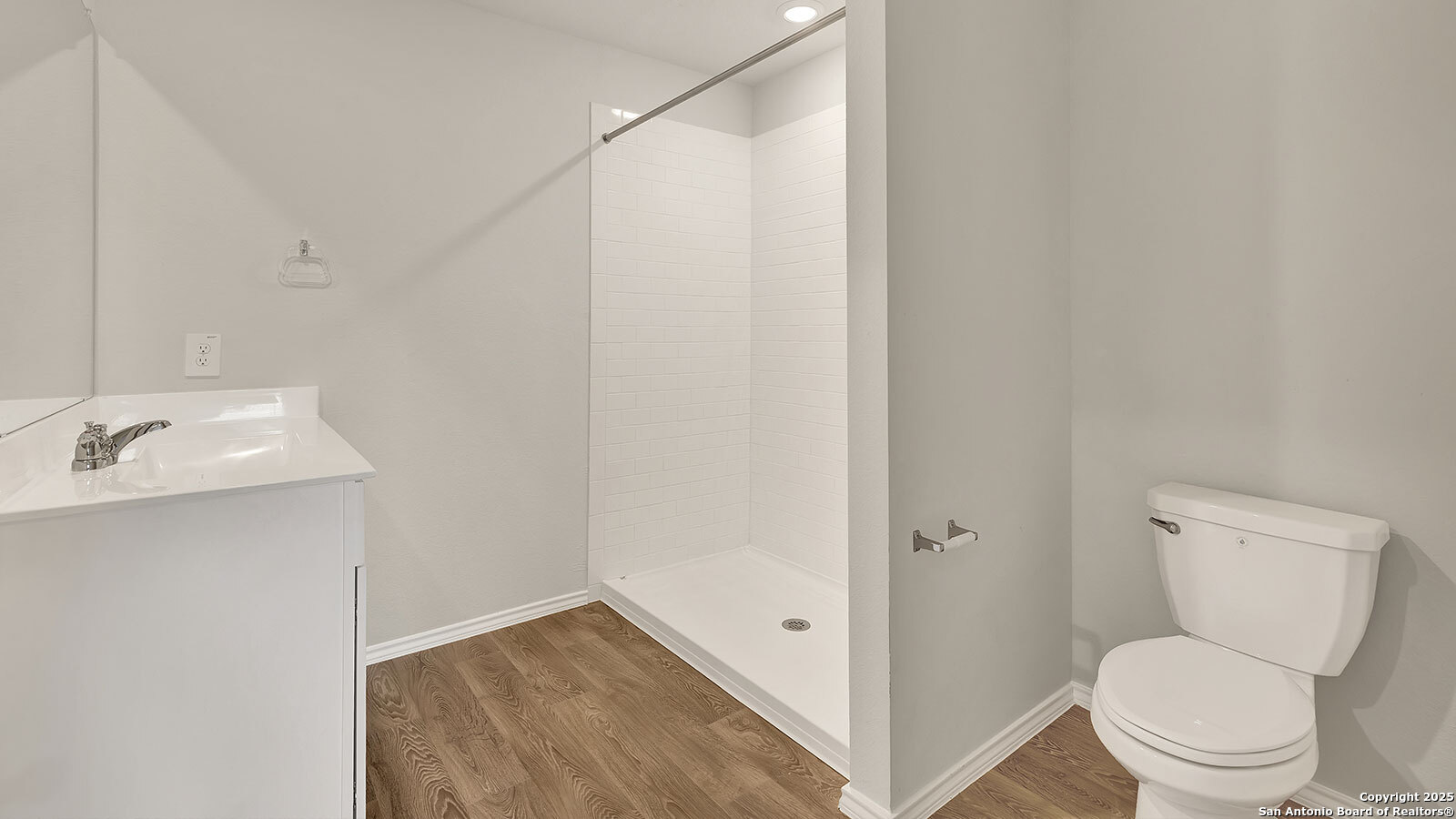 400 Wild Goose Drive Luling, TX 78648 - Photo 18 of 28 a bathroom with a sink a toilet and shower