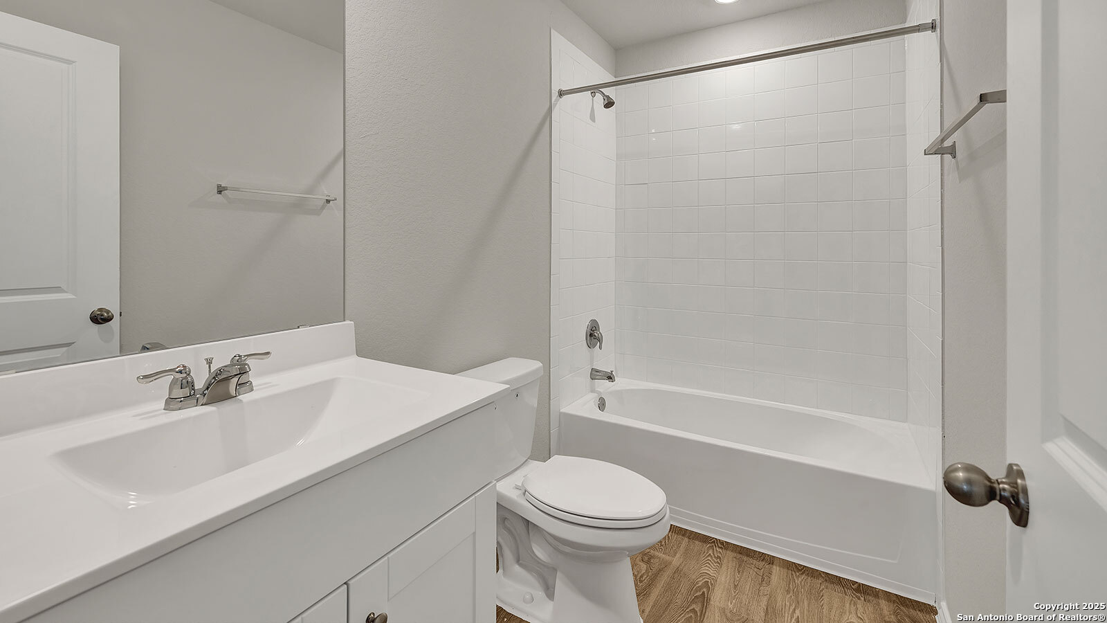 400 Wild Goose Drive Luling, TX 78648 - Photo 23 of 28 a bathroom with a sink a toilet and shower