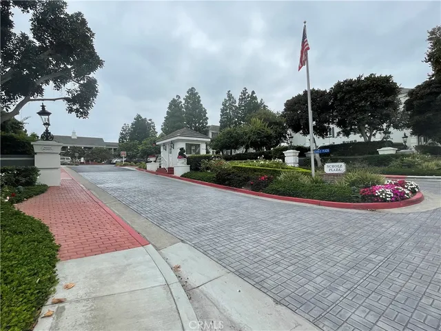 a park view with a sign board
